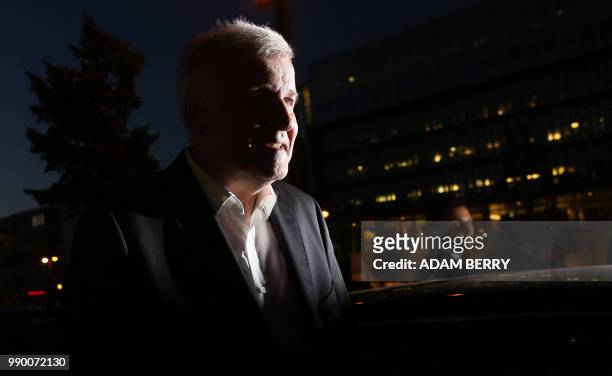 German Interior Minister and leader of the Bavarian Christian Social Union Horst Seehofer leaves the German Christian Democrats headquarters after a...