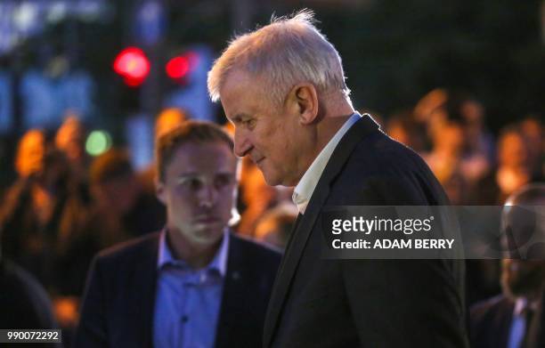 German Interior Minister and leader of the Bavarian Christian Social Union Horst Seehofer leaves the German Christian Democrats headquarters after a...