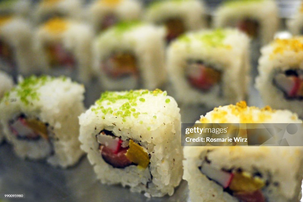 Sushi rolls with seafood and vegetables