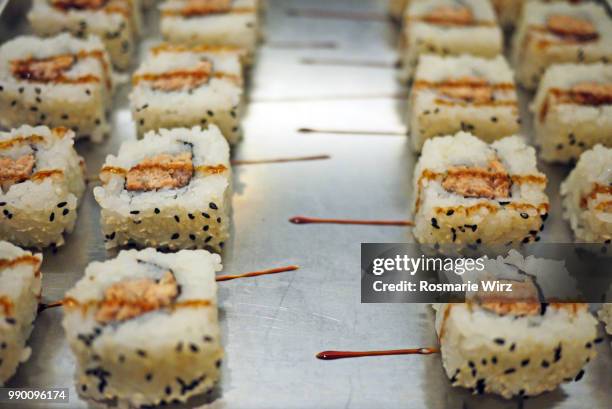 sushi rolls with seafood and seeds - rauw voedsel dieet stockfoto's en -beelden