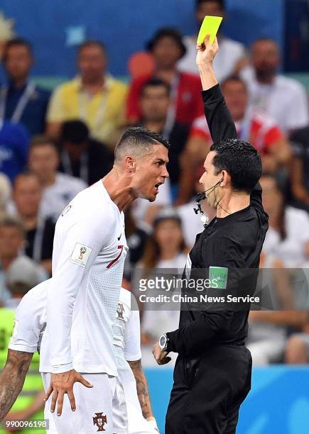 Cristiano Ronaldo of Portugal speaks to referee during the 2018 FIFA World Cup Russia Round of 16 match between Uruguay and Portugal at Fisht Stadium...