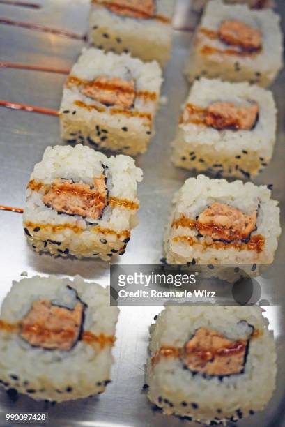 sushi rolls with seafood and seeds - raw food diet stock pictures, royalty-free photos & images