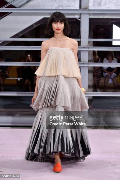 Azza Slimene walks the runway during the Maison Rabih Kayrouz Haute Couture Fall Winter 2018/2019 show as part of Paris Fashion Week on July 2, 2018...