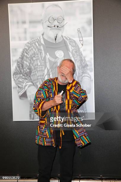 Terry Gilliam signs his photo at CineMerit Award Gala during the Munich Film Festival 2018 at Gasteig on July 2, 2018 in Munich, Germany.