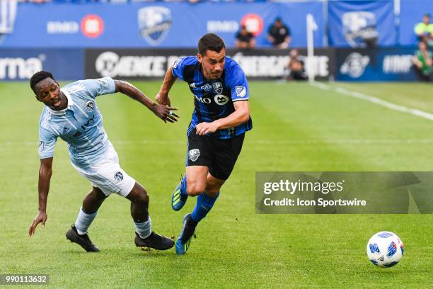 Montreal Impact defender Daniel Lovitz leaves behind Sporting Kansas City forward Gerso Fernandes while running towards the ball during the Sporting...