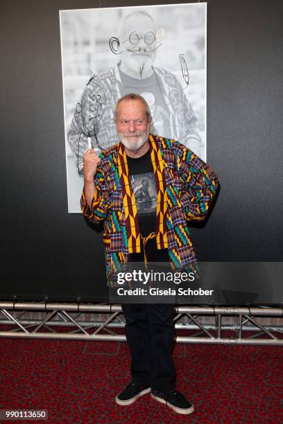 Terry Gilliam signs his photo at CineMerit Award Gala during the Munich Film Festival 2018 at Gasteig on July 2, 2018 in Munich, Germany.