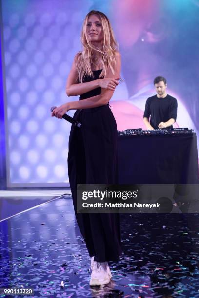 Carolin Niemczyk of the band Glasperlenspiel performs at the Lascana show during the Berlin Fashion Week Spring/Summer 2019 at Hotel nhow on July 2,...