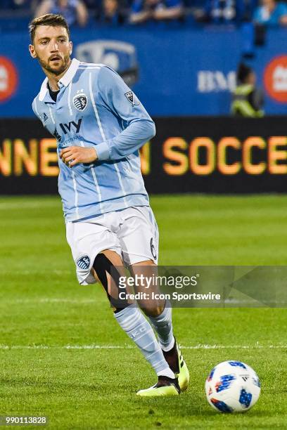 Sporting Kansas City midfielder Ilie Sanchez kicks the ball away during the Sporting Kansas City versus the Montreal Impact game on June 30 at Stade...