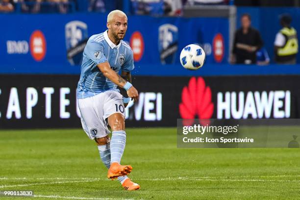 Sporting Kansas City midfielder Yohan Croizet watches the ball in the air after kicking it during the Sporting Kansas City versus the Montreal Impact...