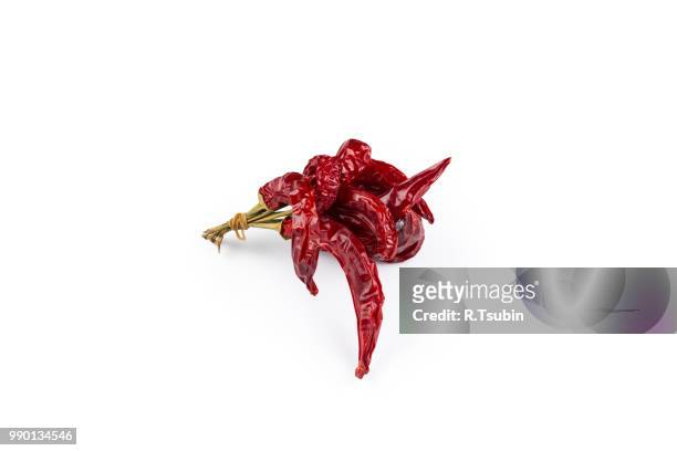dried red chili peppers isolated on white background - pimienta stock pictures, royalty-free photos & images