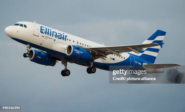 The A319 airbus from the Greek airline company Ellinair takes off from Stuttgart airport, 02 January 2018. Photo: Christoph Schmidt/dpa