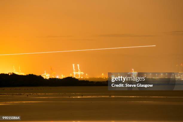 sunset over port of brisbane - glasgow sunrise stock pictures, royalty-free photos & images