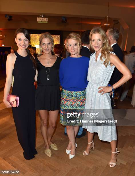 Actress Julia Hartmann, Nathalie Pollock, Nina Gummich and Nina Gnaedig attend the UFA Fiction Reception during the Munich Film Festival 2016 at Cafe...