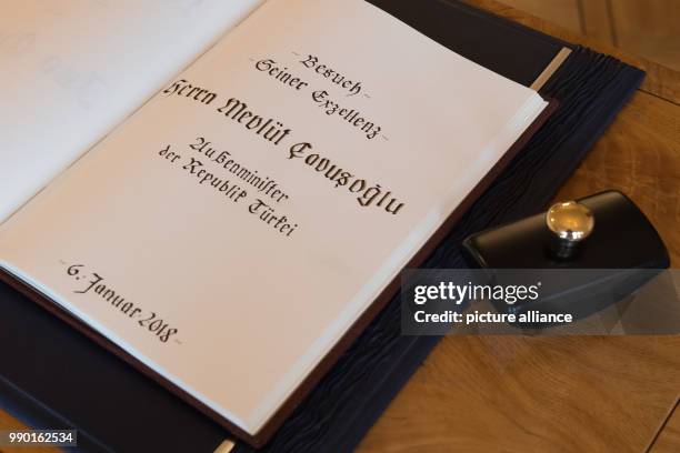 The Golden Book of the city of Goslar lies on a table in the Kaiserpfalz in Goslar, Germany, 6 January 2018. Gabriel welcomed the Turkish Minister of...