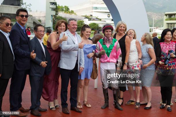 Jockey Tommy Berry and his family celebrate after Jade Fortune winning Race 9 Striding On Together 1650m Handicap at Sha Tin racecourse on July 1 ,...