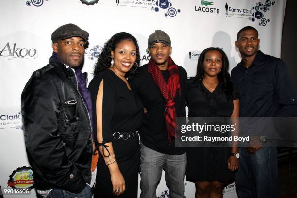 Actor Hosea Chanchez of WB's "The Game" and members of his Watch Me Win Foundation poses for photos at the Harold Washington Cultural Center during...