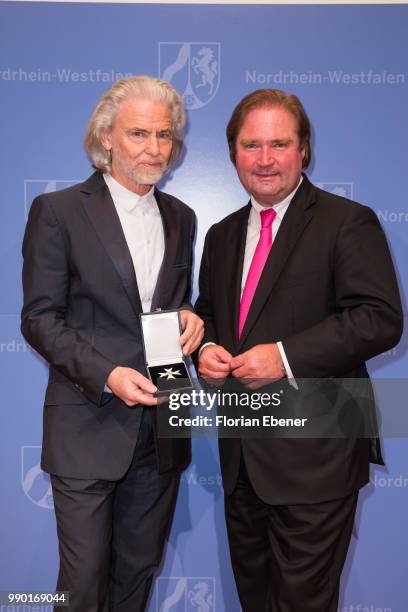 Hermann Buehlbecker and Lutz Lienenkaemper during the bestowal of the Order of Merit of North Rhine-Westphalia on July 2, 2018 in Duesseldorf,...