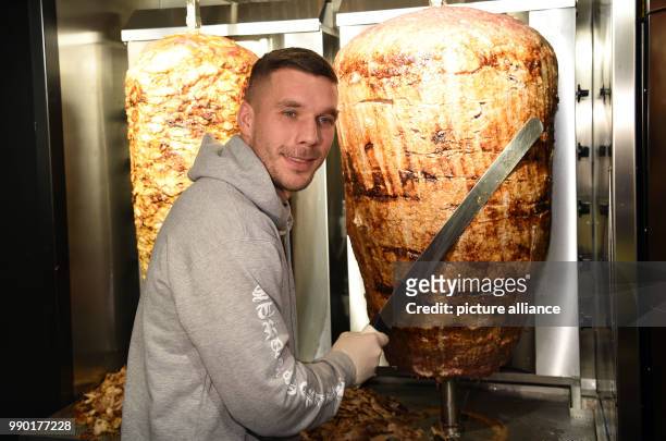 German soccer star Lukas Podolski attends the opening of a doner shop in Cologne, Germany, 6 January 2018. Podolski is a co-partner of the 'Mangal...