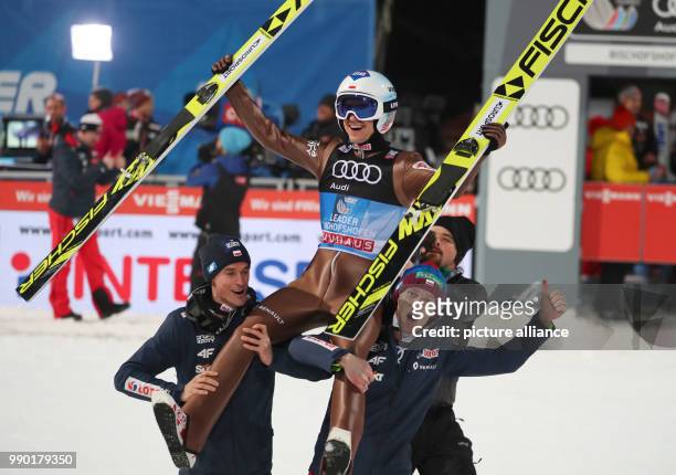 Kamil Stoch of Poland reacts after his jump in the second round at the Four Hills Tournament in Bischofshofen, Austria, 6 January 2018. Stoch won...