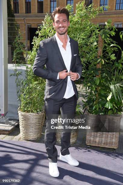 Sebastian Pannek attends the Guido Maria Kretschmer show during the Berlin Fashion Week Spring/Summer 2019 at ewerk on July 2, 2018 in Berlin,...