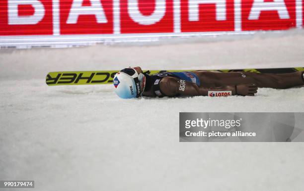 Kamil Stoch of Poland reacts during his jump in the second round at the 66th Four Hills Tournament in Bischofshofen, Austria, 6 January 2018. Stoch...