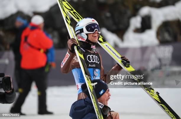 Kamil Stoch of Poland reacts after his jump in the second round at the 66th Four Hills Tournament in Bischofshofen, Austria, 6 January 2018. Stoch...