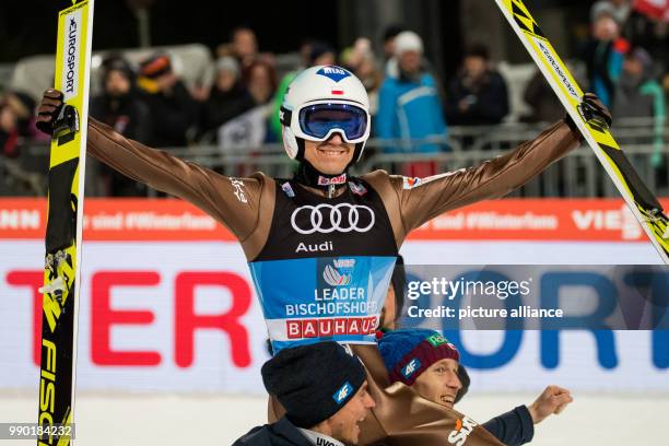 Kamil Stoch of Poland reacts after the his jump in the second round at the Four Hills Tournament in Bischofshofen, Austria, 6 January 2018. Stoch won...