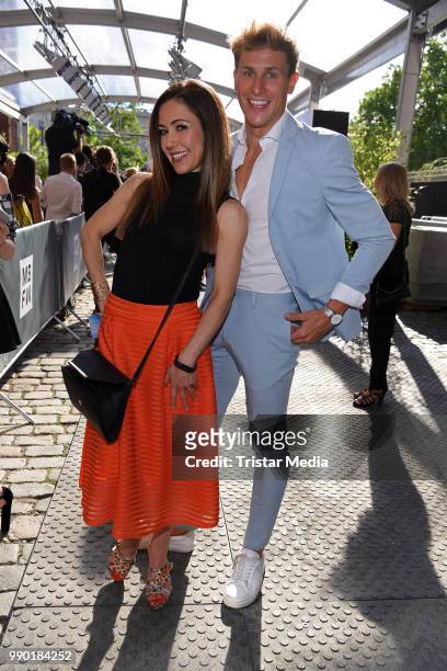 Anastasia Zampounidis and Lukas Sauer attend the Guido Maria Kretschmer show during the Berlin Fashion Week Spring/Summer 2019 at ewerk on July 2,...