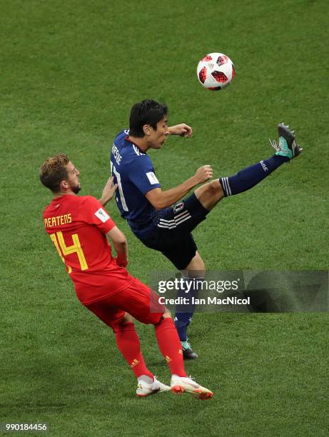 Dries Mertens of Belgium vies with Makoto Hasebe of Japan during the 2018 FIFA World Cup Russia Round of 16 match between Belgium and Japan at Rostov...