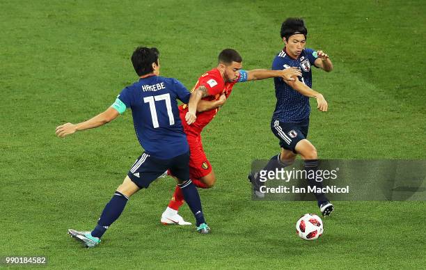 Makoto Hasebe of Japan vies with Eden Hazard of Belgium during the 2018 FIFA World Cup Russia Round of 16 match between Belgium and Japan at Rostov...