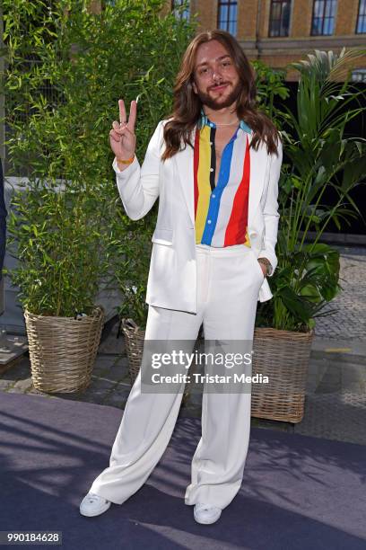 Riccardo Simonetti attends the Guido Maria Kretschmer show during the Berlin Fashion Week Spring/Summer 2019 at ewerk on July 2, 2018 in Berlin,...