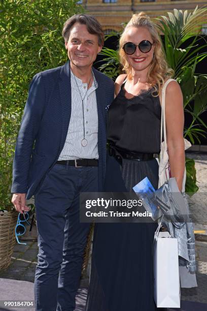 Wolfgang Bahro and Eva Mona Rodekirchen attend the Guido Maria Kretschmer show during the Berlin Fashion Week Spring/Summer 2019 at ewerk on July 2,...