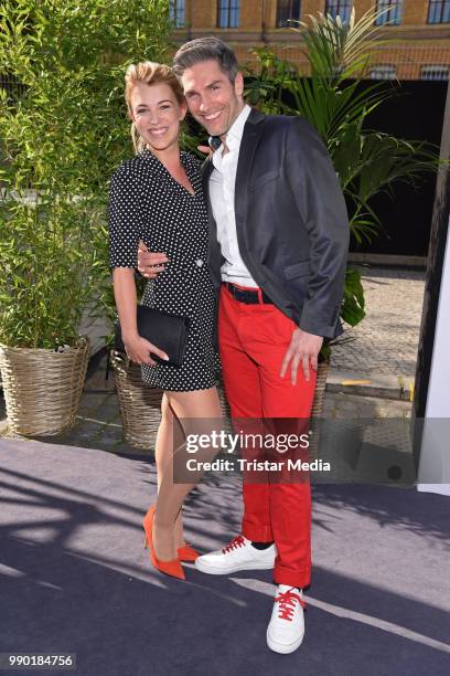 Iris Mareike Steen and Christian Polanc attend the Guido Maria Kretschmer show during the Berlin Fashion Week Spring/Summer 2019 at ewerk on July 2,...