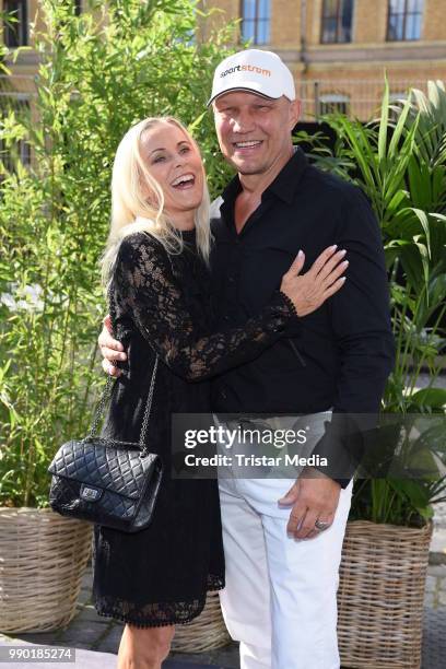 Axel Schulz and his wife Patricia Schulz attend the Guido Maria Kretschmer show during the Berlin Fashion Week Spring/Summer 2019 at ewerk on July 2,...
