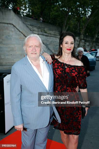 Niels Arestrup and Isabelle Le Nouvel attend Line Renaud's 90th Anniversary on July 2, 2018 in Paris, France.