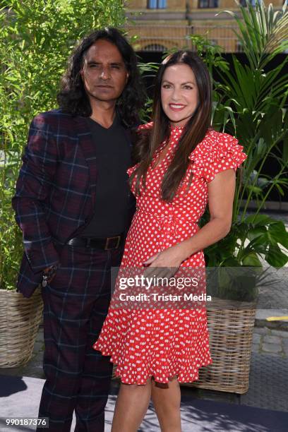 Christine Neubauer and her boyfriend Jose Campos attend the Guido Maria Kretschmer show during the Berlin Fashion Week Spring/Summer 2019 at ewerk on...