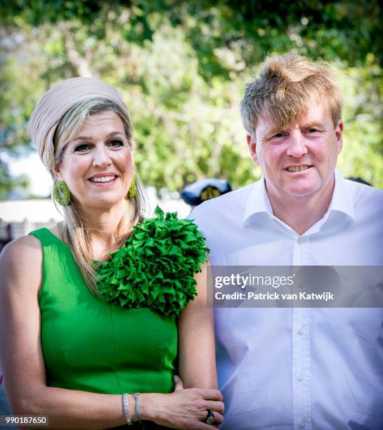 King Willem-Alexander of The Netherlands and Queen Maxima of The Netherlands visits Excel Arts Academy during the Dia di Bandera celebrations on July...