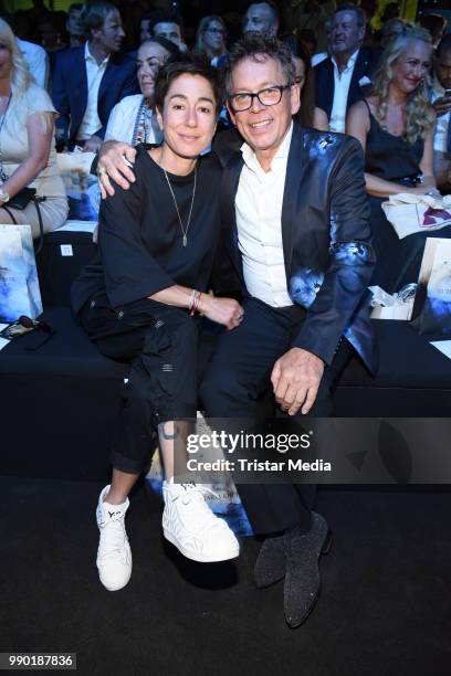 Dunja Hayali and Frank Mutters attend the Guido Maria Kretschmer show during the Berlin Fashion Week Spring/Summer 2019 at ewerk on July 2, 2018 in...