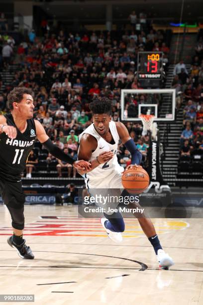 Kobi Simmons of the Memphis Grizzlies handles the ball against the Atlanta Hawks during the 2018 Summer League at the Vivint Smart Home Arena on July...