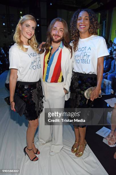 Tanja Buelter, Riccardo Simonetti and Annabelle Mandeng attend the Guido Maria Kretschmer show during the Berlin Fashion Week Spring/Summer 2019 at...
