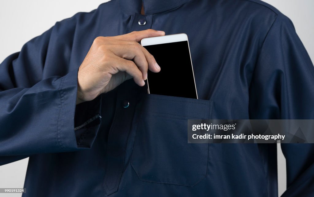 Mobile phone in pocket