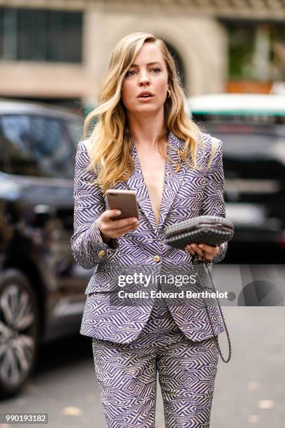 Melissa George wears a blazer jacket , outside Schiaparelli, during Paris Fashion Week Haute Couture Fall Winter 2018/2019, on July 2, 2018 in Paris,...