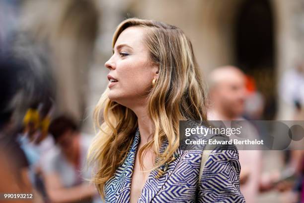 Melissa George wears a blazer jacket , outside Schiaparelli, during Paris Fashion Week Haute Couture Fall Winter 2018/2019, on July 2, 2018 in Paris,...