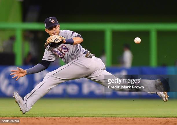Willy Adames of the Tampa Bay Rays makes the catch in the third inning against the Miami Marlins at Marlins Park on July 2, 2018 in Miami, Florida.