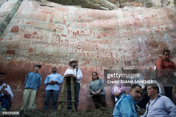 Colombian President Juan Manuel Santos speaks during a press conference to announce the expansion by 1.5 million hectares of the Chiribiquete...