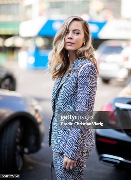 Melissa George is seen outside Schiaparelli on day two during Paris Fashion Week Haute Couture FW18 on July 2, 2018 in Paris, France.