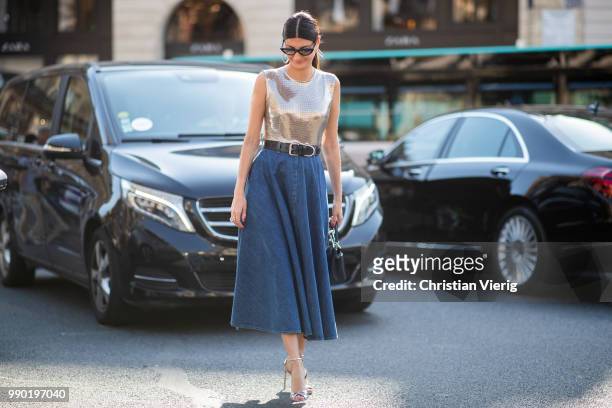 Giovanna Battaglia wearing high waist denim shirt, Hermes, glitter top is seen outside Schiaparelli on day two during Paris Fashion Week Haute...