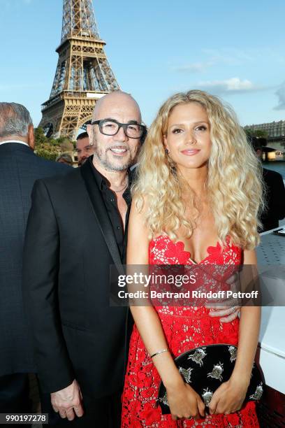 Pascal Obispo and Julie Hantson attend Line Renaud's 90th Anniversary on July 2, 2018 in Paris, France.