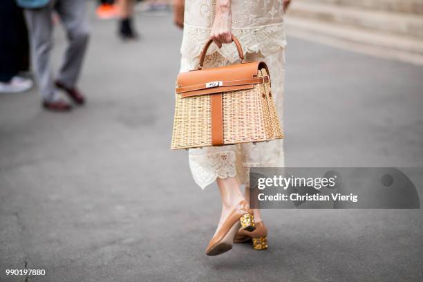 Lauren Santo Domingo wearing Hermes bag is seen outside Schiaparelli on day two during Paris Fashion Week Haute Couture FW18 on July 2, 2018 in...