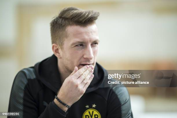 Borussia Dortmund's Marco Reus speaking to the press at a press conference during the club's winter training in Marbella, Spain, 07 January 2018....